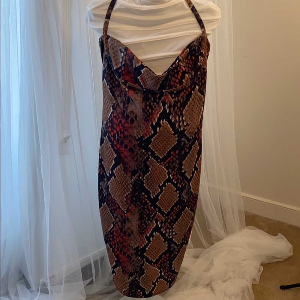 Size 10 snakeskin designed, fitted dress